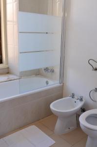 Ванная комната в Residencial Moderna