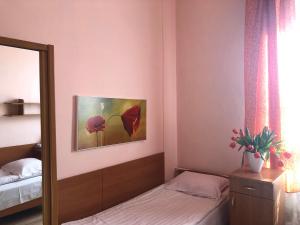 Łóżko lub łóżka w pokoju w obiekcie Hotel Haga