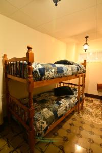Ein Etagenbett oder Etagenbetten in einem Zimmer der Unterkunft EVA & TRAVEL - El Cor del Montsant