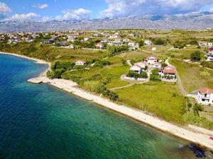 an aerial view of a small town next to the ocean at Villa Sabina - Apartments Kroatien in Ražanac