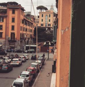 a view of a city street with cars parked at Alea Home Roma in Rome