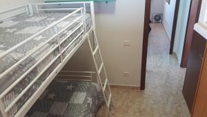 Posteľ alebo postele v izbe v ubytovaní Burrero Seasight