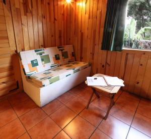 Postel nebo postele na pokoji v ubytování Cabañas El Estribo Hotel