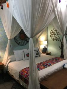 Кровать или кровати в номере Casa Juanita