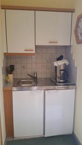 Kuchyň nebo kuchyňský kout v ubytování Gästehaus Karoline