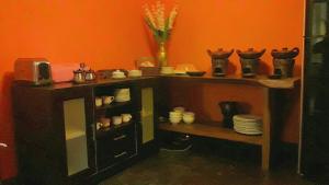 Η κουζίνα ή μικρή κουζίνα στο Puri Minggiran Guest House