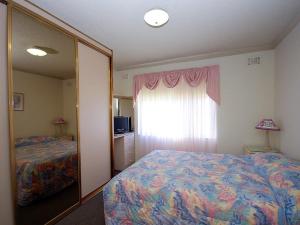 Posteľ alebo postele v izbe v ubytovaní Avilla Court 1
