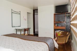 Kuchyň nebo kuchyňský kout v ubytování Hotel El Altar