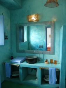 a bathroom with a sink and a mirror at Casa da Ermida de Santa Catarina in Santa Eulália