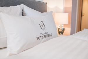 Postel nebo postele na pokoji v ubytování Villa von Boyneburgk