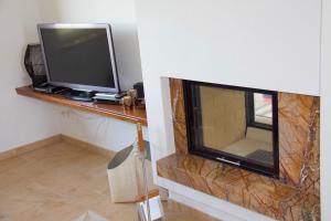 Et tv og/eller underholdning på Ferienhaus Tobias