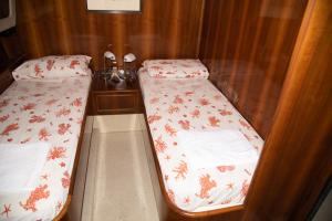 Krevet ili kreveti u jedinici u okviru objekta Riviera Boat Resort
