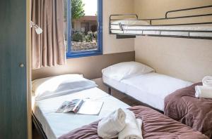 hu Venezia Camping in Town客房内的一张或多张床位