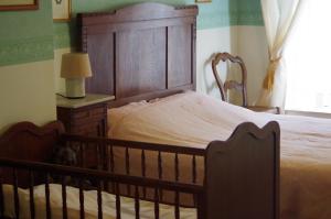 Кровать или кровати в номере Lin-La-Bedin