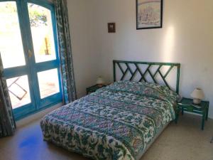 Кровать или кровати в номере San Ciprianu