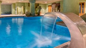 The swimming pool at or close to Senator Granada