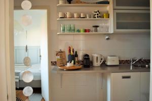 A kitchen or kitchenette at Gellért Hill Apartment