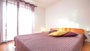 Postel nebo postele na pokoji v ubytování Apartment Medulin