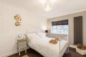 Postel nebo postele na pokoji v ubytování Luxury London Apartment
