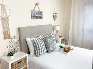 Postel nebo postele na pokoji v ubytování Cosy Flats Alicante
