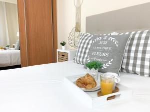 Postel nebo postele na pokoji v ubytování Cosy Flats Alicante