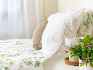 Postel nebo postele na pokoji v ubytování Cosy Flats Alicante