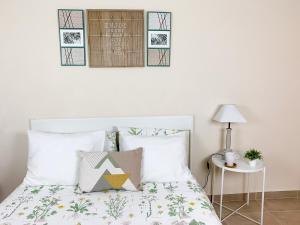 Postel nebo postele na pokoji v ubytování Cosy Flats Alicante