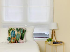 Postel nebo postele na pokoji v ubytování Cosy Flats Alicante