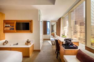 Postel nebo postele na pokoji v ubytování Concorde Hotel New York