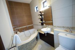Vannituba majutusasutuses Villasun Luxury Apartments & Villas