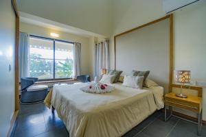 Voodi või voodid majutusasutuse Villasun Luxury Apartments & Villas toas