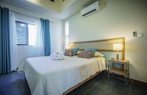 Voodi või voodid majutusasutuse Villasun Luxury Apartments & Villas toas
