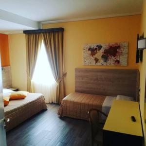 Katil atau katil-katil dalam bilik di Parc Hotel
