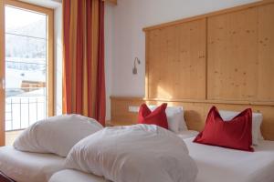 Säng eller sängar i ett rum på Bacherhof