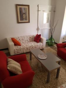 A seating area at Stunning Aptm in Villa