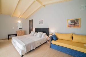 Posteľ alebo postele v izbe v ubytovaní Tsolakis Studios & Apartments