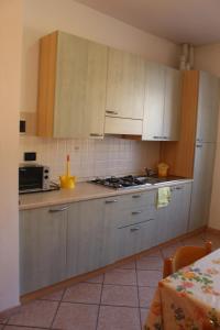 Køkken eller tekøkken på Appartamenti Tra gli Ulivi