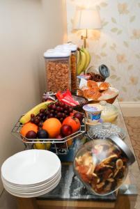 a table with a bunch of food on it at BELL CRAIG GUEST HOUSE in Fife