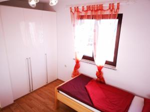 Postel nebo postele na pokoji v ubytování Apartman "Sabine red" with heated pool