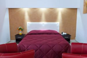 Katil atau katil-katil dalam bilik di Hotel 660
