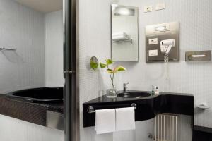 Koupelna v ubytování UNA HOTELS Vittoria Firenze