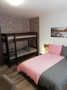 Postel nebo postele na pokoji v ubytování Apartmany Agatha