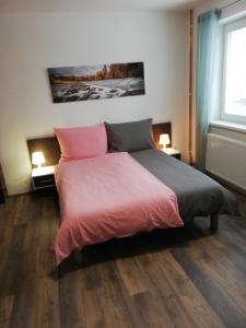 Postel nebo postele na pokoji v ubytování Apartmany Agatha