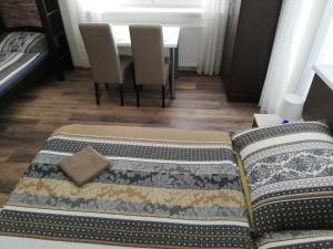 Postel nebo postele na pokoji v ubytování Apartmany Agatha