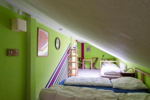 Voodi või voodid majutusasutuse Labyrinth Hostel Weimar toas
