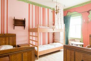 Voodi või voodid majutusasutuse Labyrinth Hostel Weimar toas