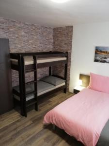 Postel nebo postele na pokoji v ubytování Apartmany Agatha