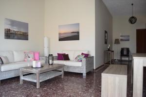 Posedenie v ubytovaní Modern Apartment with Garden