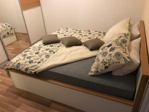 Postel nebo postele na pokoji v ubytování Apartman MIG