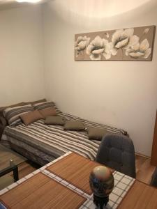 Postel nebo postele na pokoji v ubytování Apartman MIG